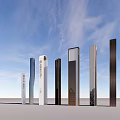 Modern Landscape Sculptures With Tall Columnar Shapes And Various Heights Against Blue Sky