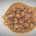 Woven Storage Basket Filled With Fresh Walnuts For Home Storage Use 3d model