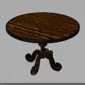 Vintage Round Wooden Table With Intricate Carved Legs And Natural Wood Grain Top