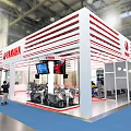 YAMAHA Exhibition Booth With White Red Striped Design And Displayed Motorcycles Screens