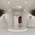Modern Bridal Shop Interior Design With Two Wedding Dresses And Plants
