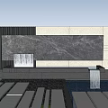 Modern Landscape Feature Wall With Stone Surface Surrounded By Trees Plants And Water Pond