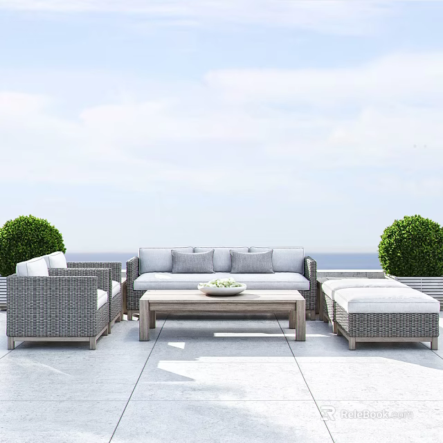 Gray Wicker Outdoor Sofa Set with Coffee Table Green Shrubs and Ocean View 3d model 