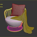 Cozy Rattan Chair with White Cushion Gray Geometric Pillow and Patterned Blanket