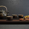 Traditional Tea Set Featuring Metal Teapot Bamboo Handle Ceramic Teacups and Pastries on Wooden Tray