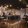 Modern Bar Interior With Hexagonal Counter Pendant Lights And Wooden Flooring