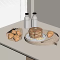 Pancakes Stacked With Syrup Banana Slices Croissants In Wooden Basket Milk Bottles On White Table