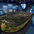 Cultural Center Showcasing Ancient City Model With Night Scene Lighting And Silhouettes