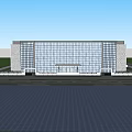 Modern Architectural Building With Glass Facade Geometric Patterns And Trees In Front Plaza