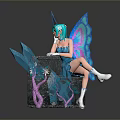 Blue Haired Fairy Figurine Sitting On Decorative Box With Blue Wings And Feathers