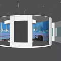 Modern Circular Exhibition Space with Curved White Walls and Large Windows Overlooking Seaview and Cityscape