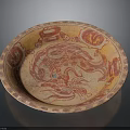 Traditional Carved Circular Plate with Red Dragon Pattern and Decorative Border