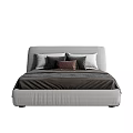 Modern Minimalist Double Bed With Gray Headboard And Multiple Pillows In Gray White Brown Tones