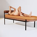 Orange Lounge Chair With Black Metal Frame For Relaxing And Using Phone