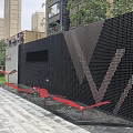 Modern Feature Wall Design With Green Lawn Trees And Paved Ground In Front Of Building