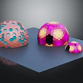 Colorful Hemispherical Structures With Hexagonal Patterns On Blue Platform