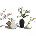 Vases in Various Colors with Flowers and Green Plants in Different Designs for Home Decor