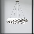 Elegant Modern White Chandelier With Wavy Texture Hanging In Minimalist Space