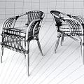 Two Rattan Armchairs with White Cushions and Modern Woven Design Structure