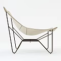 Beige Leather Leisure Chair With Curved Design And Black Metal Frame