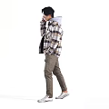 Man Wearing Plaid Shirt Gray Turtleneck And Khaki Pants Talking On Phone