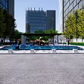 Dianshan Lake Modern Entrance Gate With Green Vertical Garden Red Trees And Brick Paved Ground
