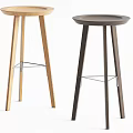 Two Modern Wooden Bar Stools With Light And Dark Wood Tones And Metal Support