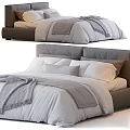 Modern Double Bed With White Linen Sheets Gray Blanket And Upholstered Headboard