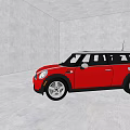 Red Five Door Compact Car With Black Roof And Alloy Wheels In Gray Indoor Showroom