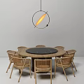 Round Dining Table Set with Black Marble Top and Woven Rattan Chairs Featuring Pendant Light