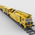 Yellow Building Blocks Toy Train Model on Detailed Railway Track