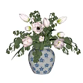 Blue and White Floral Patterned Vase with Pink Blooms and Green Leaves
