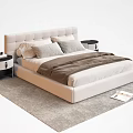 Light Upholstered Double Bed With Gray Pillows Brown Blanket And Nightstands On Gray Rug