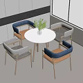 Modern Round Table With Four Chairs Blue Gray Backrest And Wooden Legs In Bright Room