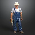 Man in White Hard Hat and Blue Overalls Holding Drill in Gray T-shirt