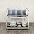Kitchen Cabinet With Stainless Steel Dish Rack Plates Bowls And Tile Wall