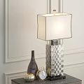 Elegant Modern Table Lamp With Silver Square Textured Base And White Lampshade On Bedside Table 3d model