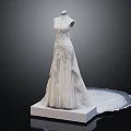 Elegant White Wedding Dress With Intricate Embroidery And Long Train On Mannequin