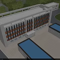 Industrial Factory With Blue Roofs Surrounded By Green Trees And Access Road With Trucks