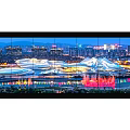 Multi Screen Computer Monitor Displaying High Definition Urban City Skyline View