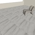White Veined Marble Floor Tiles In Bright Room With Modern Accent Chair