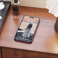 Modern Smartphone With Time Display Wallpaper And Purple Case On Wooden Table