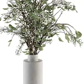 Modern Floral Arrangement with Green Leaves and White Flowers in Ceramic Vase Decor