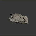 Natural Stone Rock With Rough Surface Texture And Green Moss Accents