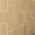 Modern Wooden Sofa Background Wall Design With Vertical Slats And Ambient Lighting For Living Room