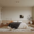 Modern Minimalist Bedroom With Beige Walls White Cabinets Black And White Quilt And Wicker Chair