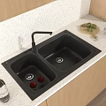 Black Double Bowl Kitchen Sink With Faucet On Light Countertop And Fruits
