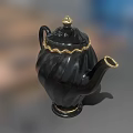Elegant Black Teapot With Gold Accents On Lid Spout And Curved Handle For Home Living