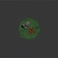 Garden Ornament with Green Grass Large Rocks Small Wood Pile and Surrounding Small Stones