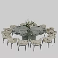 Elegant Dining Table Set with Patterned Chairs White Floral Centerpiece and Wine Glasses